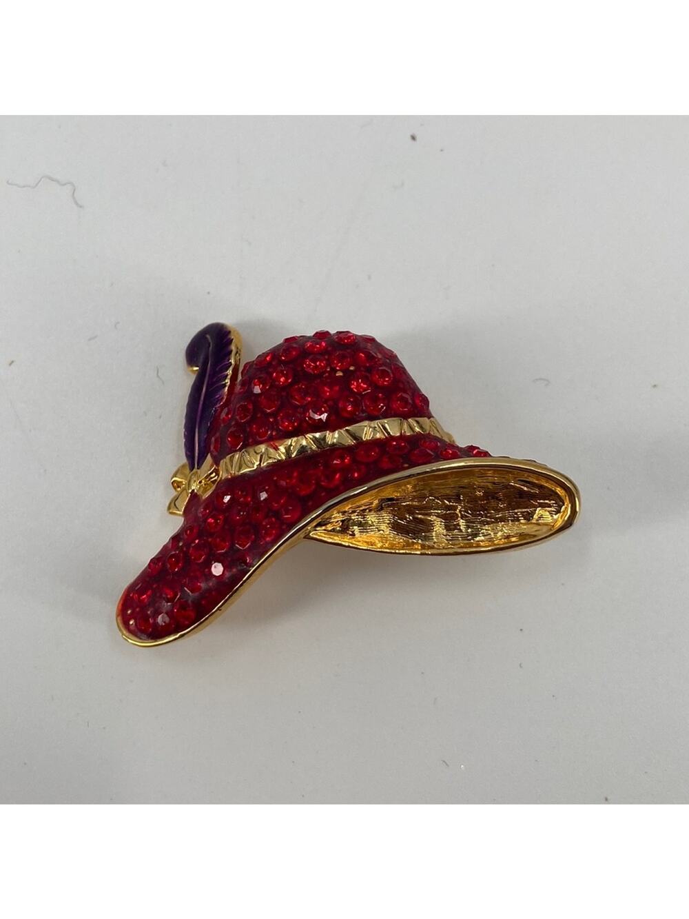 Red hatter gem encrusted pin